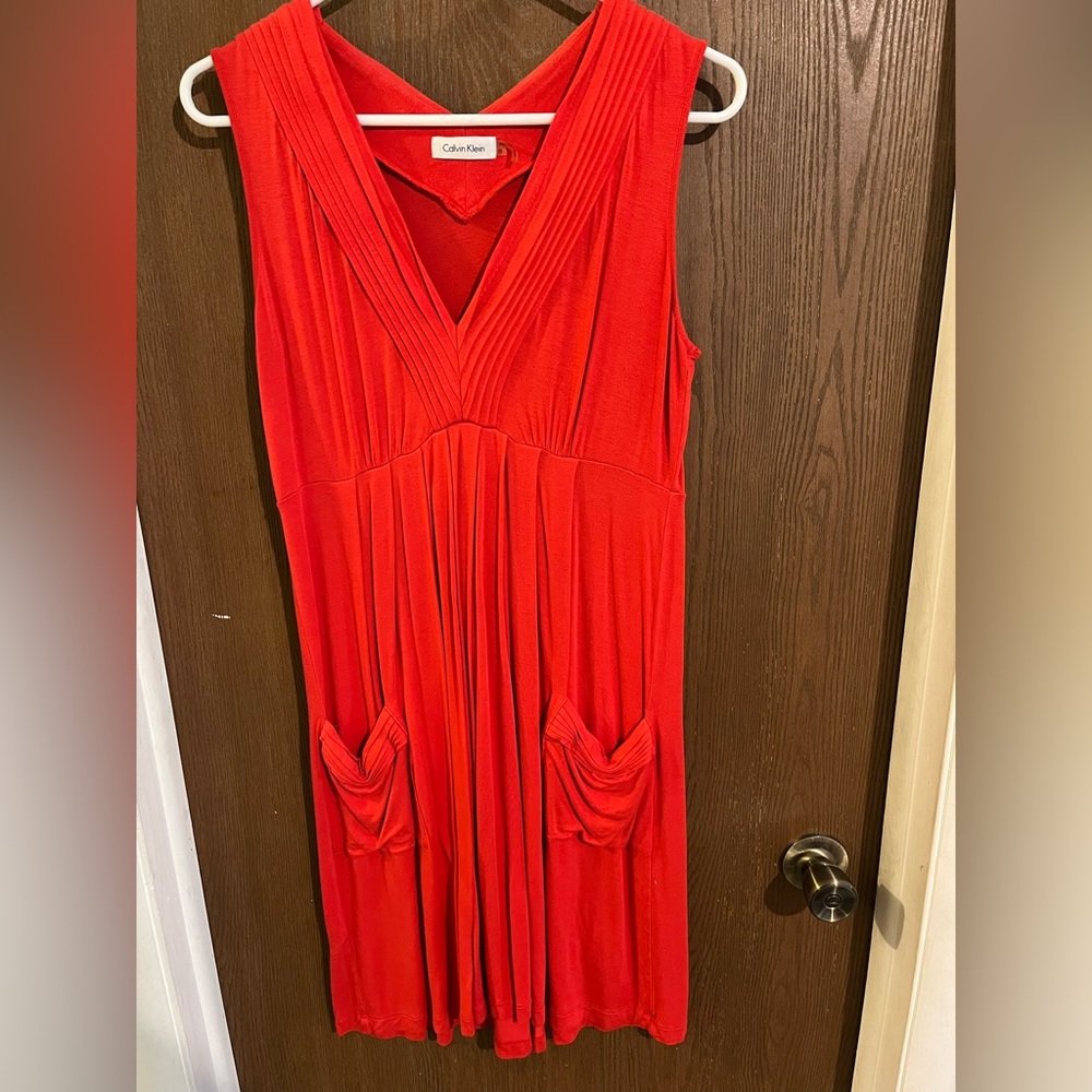 Calvin Klein, Size 8, reddish orange sleeveless dress with pockets